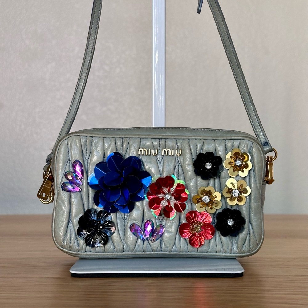 Miu Miu matelassé leather crossbody bag - Picture 1 of 14